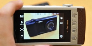 Фотокамера с мобильником